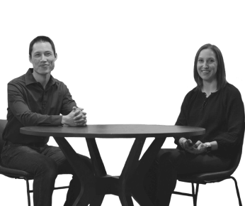 man and woman sitting at a table